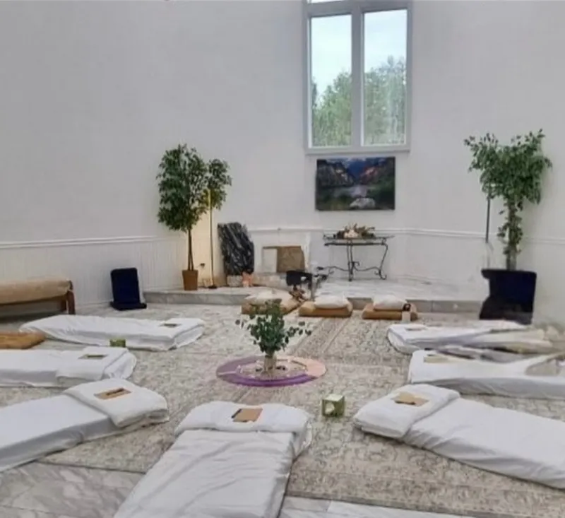 Healing circle prepared with mats and sacred items
