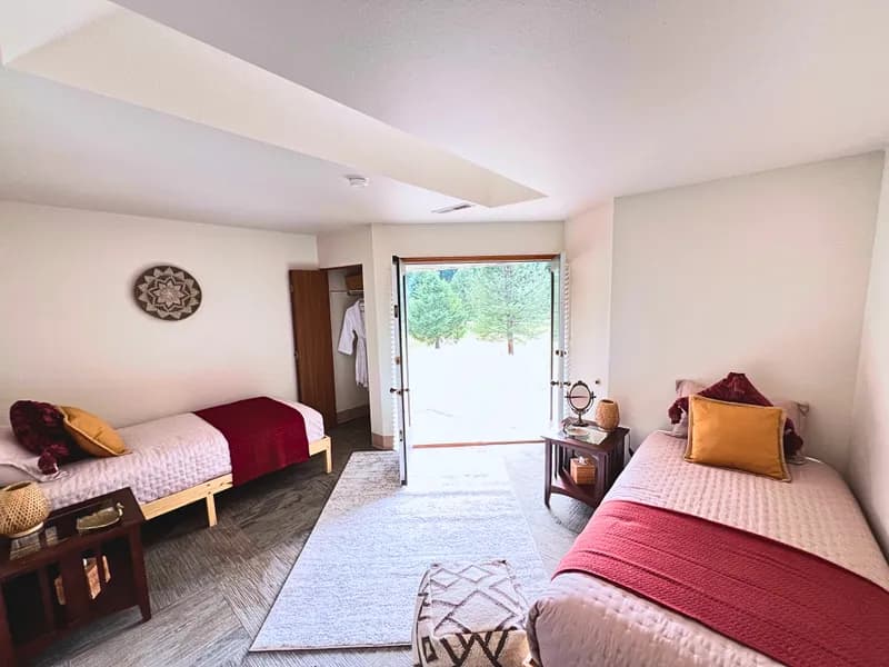 Bright room with fresh bedding and natural decor