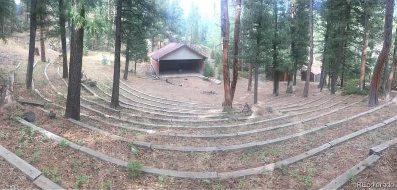 Outdoor amphitheater nestled among the trees