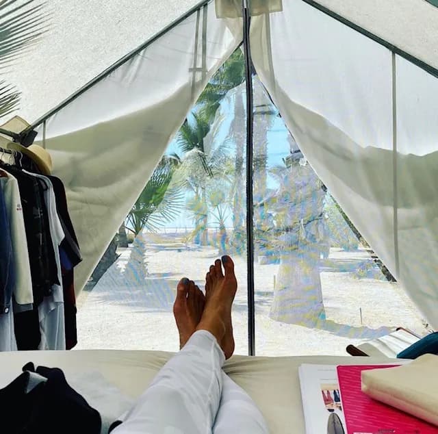 Luxury glamping tent with cozy interior furnishings