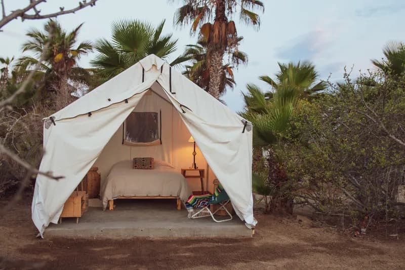 Evening view of glamping tents nestled in the foothills