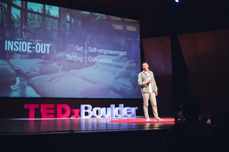 Austin Mao teaching on stage